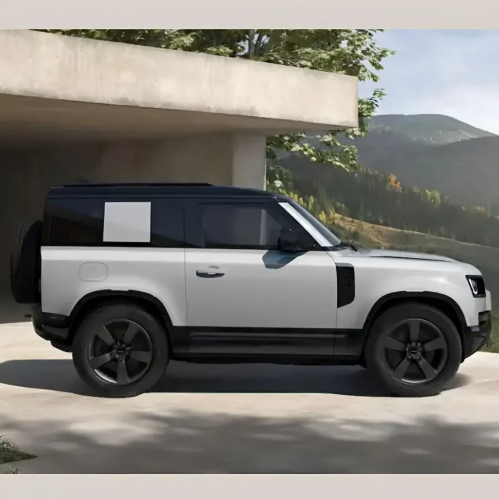 Defender elétrico chega em 2027, Range Rover elétrico ainda este ano 4 Defender elétrico estacionado em moradia numa zona de montanha