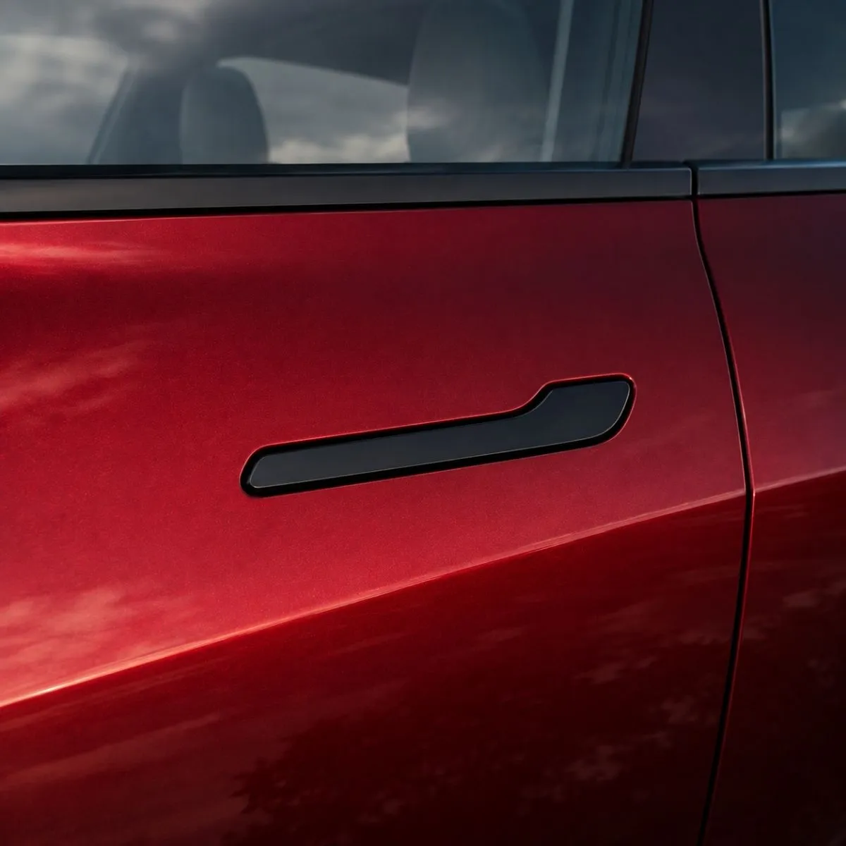 Recall da Tesla na Europa por causa das portas não é para já 2 plano aproximado de um puxador de porta de um Tesla. O recall da Tesla na europa não é para já